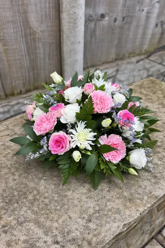 Always Loved Posies bouquet with pastel seasonal flowers