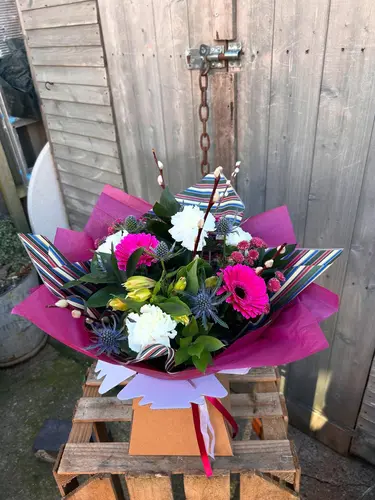 Petal Surprise bouquet with mixed seasonal flowers