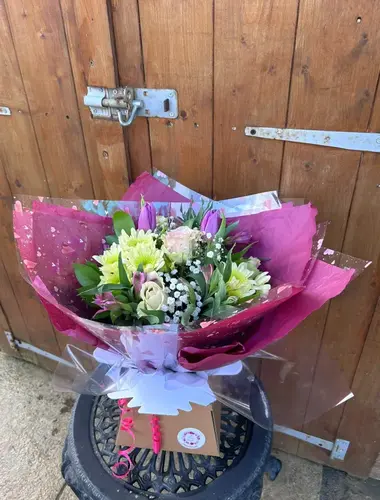 Pops bouquet with bright colourful flowers