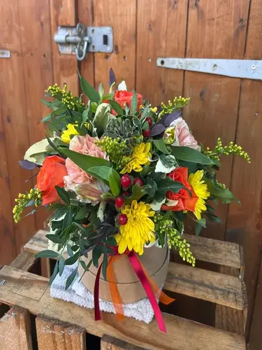 Pumpkin Spice bouquet with orange seasonal flowers